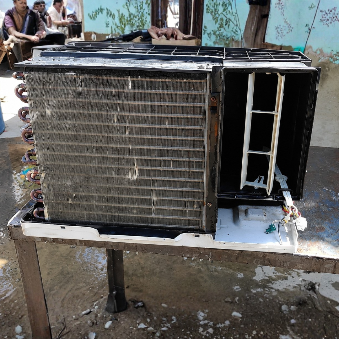 Lavado real de aire acondicionado de ventana