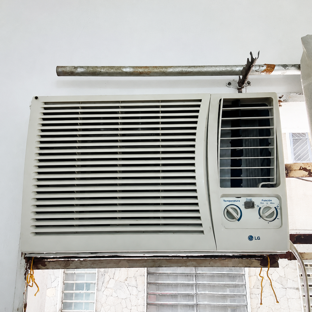 Lavado real de aire acondicionado de ventana
